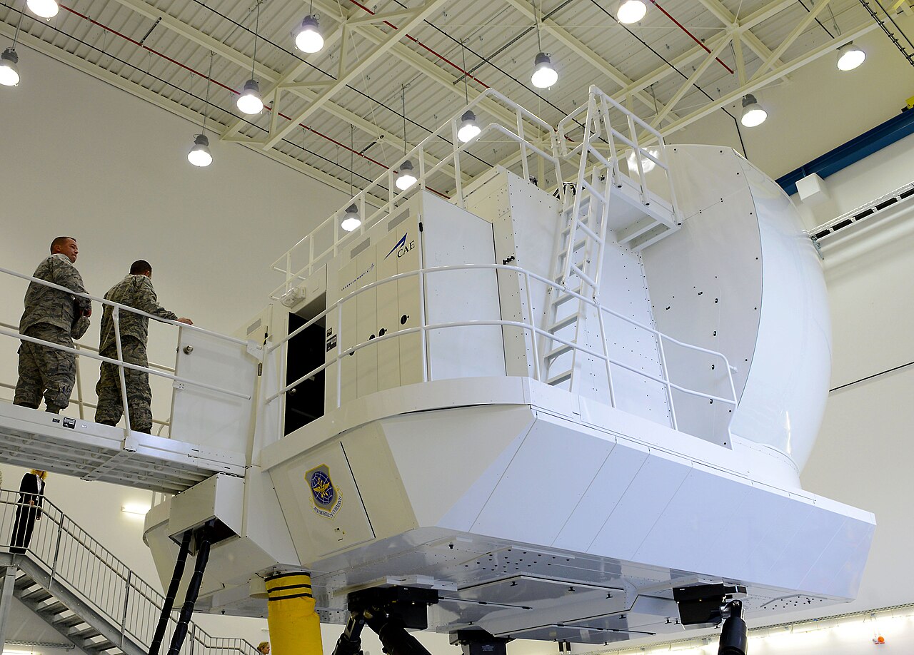 a full-motion flight simulator, like those used by the region's training industry